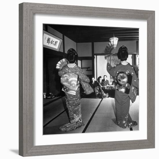 Two Geishas Dancing with Fans on Stage as Guests and Other Geshias Watch from Dinner Table-Alfred Eisenstaedt-Framed Photographic Print