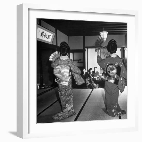 Two Geishas Dancing with Fans on Stage as Guests and Other Geshias Watch from Dinner Table-Alfred Eisenstaedt-Framed Photographic Print