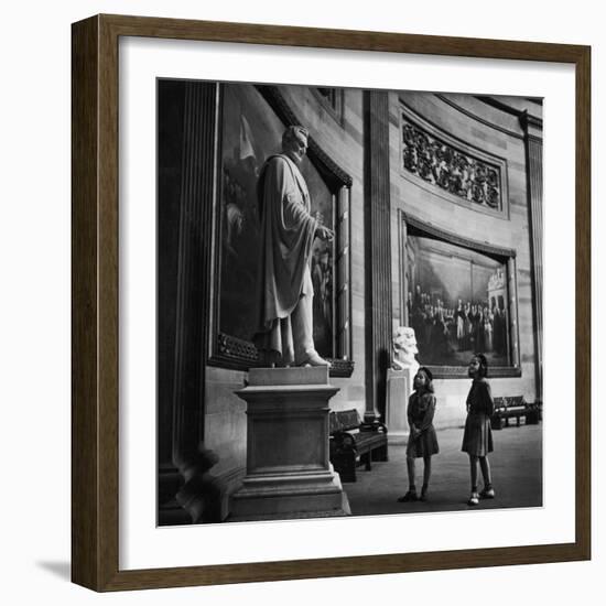 Two Girl Scouts Looking Up at Marble Statue of Abraham Lincoln, Rotunda of the Capitol Building-Alfred Eisenstaedt-Framed Photographic Print