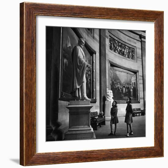 Two Girl Scouts Looking Up at Marble Statue of Abraham Lincoln, Rotunda of the Capitol Building-Alfred Eisenstaedt-Framed Photographic Print