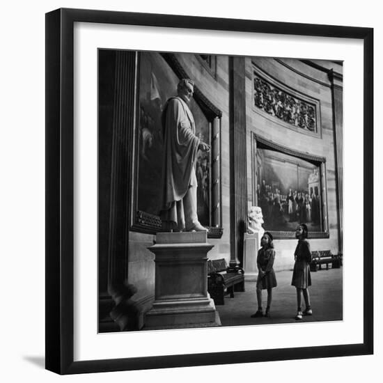 Two Girl Scouts Looking Up at Marble Statue of Abraham Lincoln, Rotunda of the Capitol Building-Alfred Eisenstaedt-Framed Photographic Print
