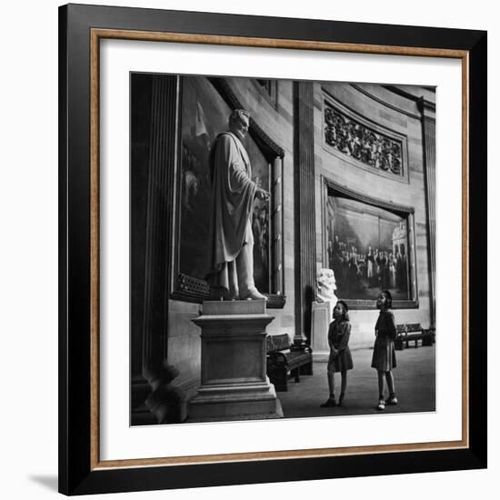 Two Girl Scouts Looking Up at Marble Statue of Abraham Lincoln, Rotunda of the Capitol Building-Alfred Eisenstaedt-Framed Photographic Print