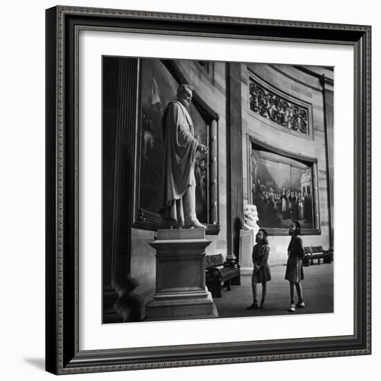 Two Girl Scouts Looking Up at Marble Statue of Abraham Lincoln, Rotunda of the Capitol Building-Alfred Eisenstaedt-Framed Photographic Print