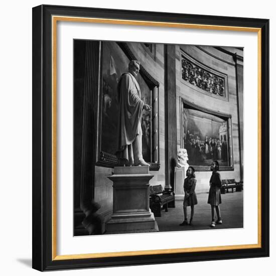 Two Girl Scouts Looking Up at Marble Statue of Abraham Lincoln, Rotunda of the Capitol Building-Alfred Eisenstaedt-Framed Photographic Print