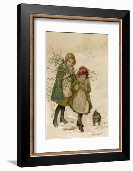Two Girls and Their Dog Gather Mistletoe in the Snow-Lizzie-Framed Photographic Print