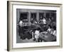 Two Girls Sitting at a Table are Playing Draughts, Four Young Woman are Playing Ping-Pong-A. Villani-Framed Photographic Print