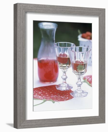 Two Glasses of Strawberry Wine on a Table in the Garden-Alena Hrbkova-Framed Photographic Print