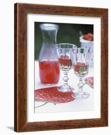 Two Glasses of Strawberry Wine on a Table in the Garden-Alena Hrbkova-Framed Photographic Print