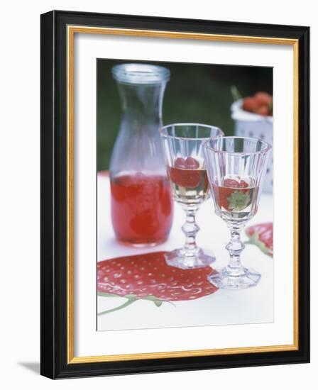 Two Glasses of Strawberry Wine on a Table in the Garden-Alena Hrbkova-Framed Photographic Print