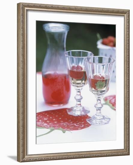 Two Glasses of Strawberry Wine on a Table in the Garden-Alena Hrbkova-Framed Photographic Print