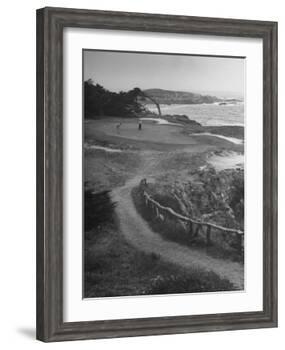 Two Golfers Playing on a Putting Green at Pebble Beach Golf Course-Nina Leen-Framed Photographic Print