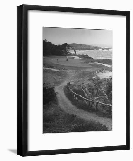 Two Golfers Playing on a Putting Green at Pebble Beach Golf Course-Nina Leen-Framed Photographic Print