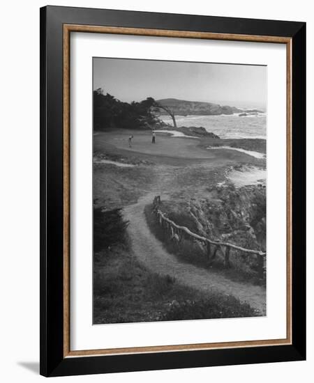 Two Golfers Playing on a Putting Green at Pebble Beach Golf Course-Nina Leen-Framed Photographic Print