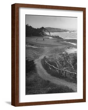 Two Golfers Playing on a Putting Green at Pebble Beach Golf Course-Nina Leen-Framed Photographic Print