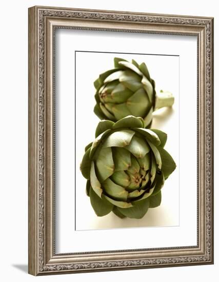 Two Green Artichokes-Alain Caste-Framed Photographic Print