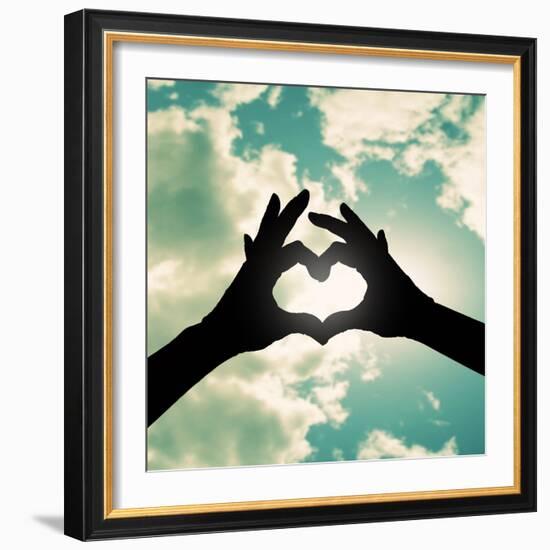 Two Hands Making a Heart Shape in the Sky Cross Processed-graphicphoto-Framed Photographic Print