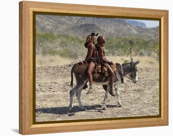 Two Happy Himba Girls Ride a Donkey to Market, Namibia-Nigel Pavitt-Framed Premier Image Canvas