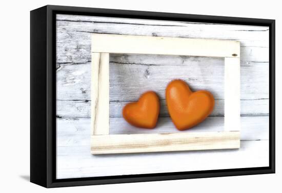 Two Hearts Made of Stone in Picture Frame-Uwe Merkel-Framed Premier Image Canvas