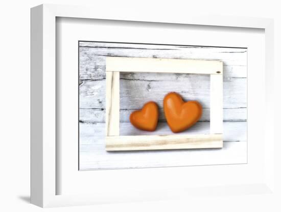 Two Hearts Made of Stone in Picture Frame-Uwe Merkel-Framed Photographic Print