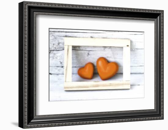 Two Hearts Made of Stone in Picture Frame-Uwe Merkel-Framed Photographic Print