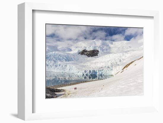 Two Hikers Surrounded by Ice-Capped Mountains and Glaciers in Neko Harbor, Polar Regions-Michael Nolan-Framed Photographic Print