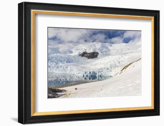 Two Hikers Surrounded by Ice-Capped Mountains and Glaciers in Neko Harbor, Polar Regions-Michael Nolan-Framed Photographic Print