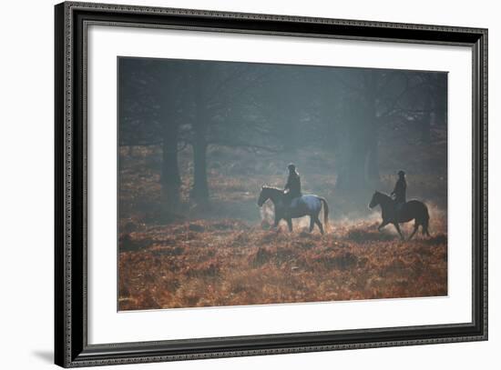 Two Horseback Riders Make their Way Through Misty Richmond Park in Winter-Alex Saberi-Framed Photographic Print