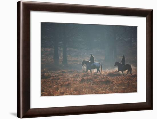Two Horseback Riders Make their Way Through Misty Richmond Park in Winter-Alex Saberi-Framed Photographic Print