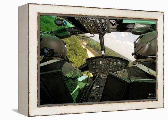 Two Instructor Pilots Practice Low Flying Operations in a Uh-1H Huey Helicopter-null-Framed Premier Image Canvas