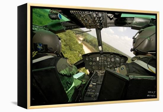 Two Instructor Pilots Practice Low Flying Operations in a Uh-1H Huey Helicopter-null-Framed Premier Image Canvas