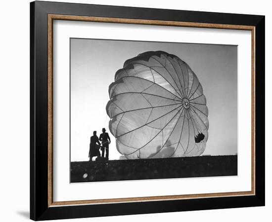 Two Irving Air Chute Co. Employees Struggling to Pull Down One of their Parachutes after Test Jump-Margaret Bourke-White-Framed Photographic Print