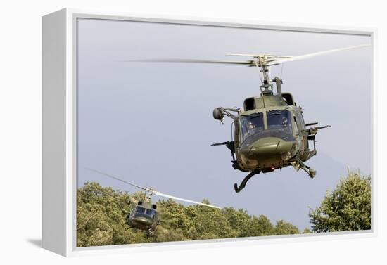 Two Italian Air Force Ab-212 Ico Helicopters Practice Low Level Flying-null-Framed Premier Image Canvas