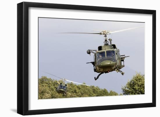 Two Italian Air Force Ab-212 Ico Helicopters Practice Low Level Flying-null-Framed Photographic Print