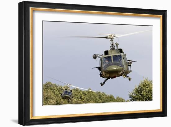 Two Italian Air Force Ab-212 Ico Helicopters Practice Low Level Flying-null-Framed Photographic Print