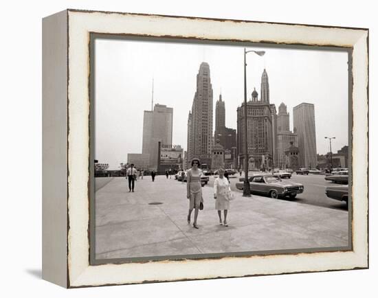 Two Ladies Walking the Sidewalk Skyscrapers in Chicago America's Windy City, in the 1960s-null-Framed Premier Image Canvas