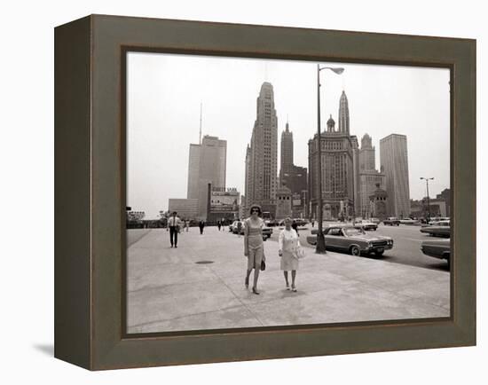 Two Ladies Walking the Sidewalk Skyscrapers in Chicago America's Windy City, in the 1960s-null-Framed Premier Image Canvas