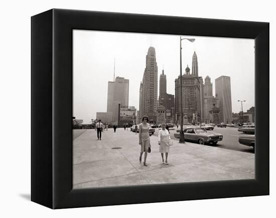 Two Ladies Walking the Sidewalk Skyscrapers in Chicago America's Windy City, in the 1960s-null-Framed Premier Image Canvas