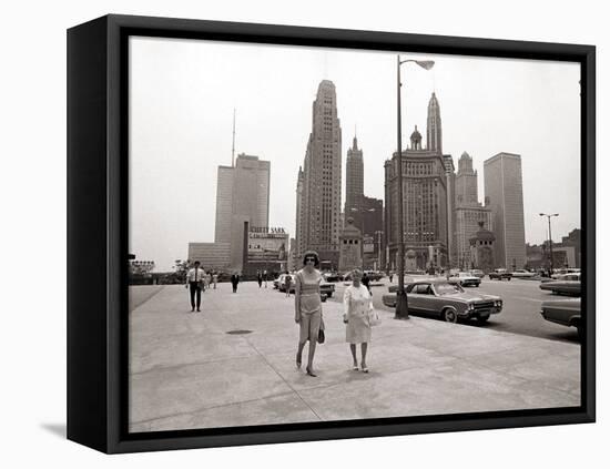 Two Ladies Walking the Sidewalk Skyscrapers in Chicago America's Windy City, in the 1960s-null-Framed Premier Image Canvas