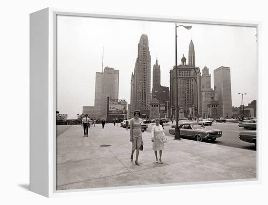 Two Ladies Walking the Sidewalk Skyscrapers in Chicago America's Windy City, in the 1960s-null-Framed Premier Image Canvas