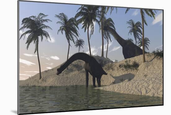 Two Large Brachiosaurus Grazing Along the Water's Edge-null-Mounted Art Print