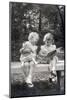 Two Little Girls Sitting on a Bench-Philip Gendreau-Mounted Photographic Print