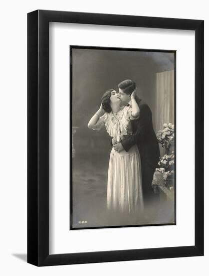 Two Lovers Embrace and Kiss-null-Framed Photographic Print