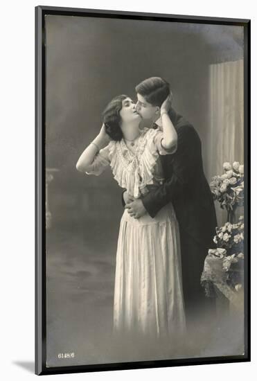 Two Lovers Embrace and Kiss-null-Mounted Photographic Print