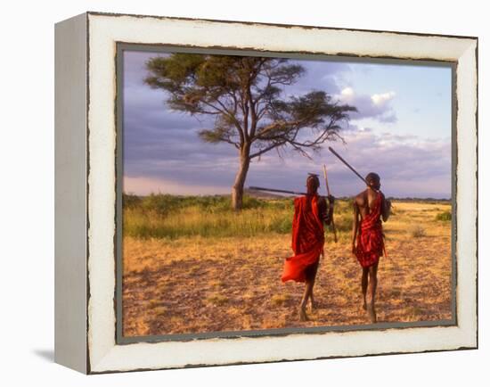 Two Maasai Morans Walking with Spears at Sunset, Amboseli National Park, Kenya-Alison Jones-Framed Premier Image Canvas