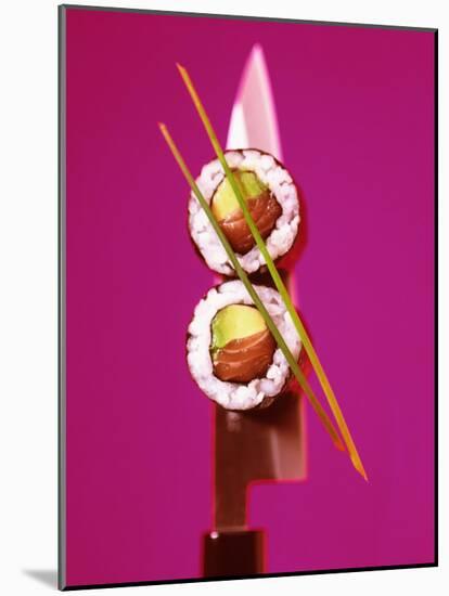 Two Maki-Sushi with Avocado and Salmon on Knife-Hartmut Kiefer-Mounted Photographic Print