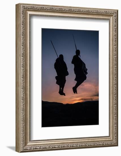 Two Masaai Warriors Silhouetted Performing Traditional Jump - Leap Kopje at Sunset-Nick Garbutt-Framed Photographic Print