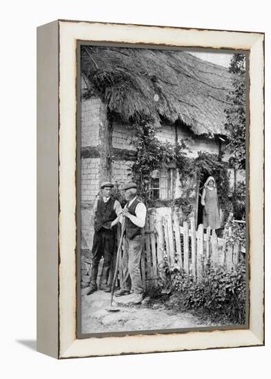 Two Men Chatting Outside a Cottage, Near Lucton, Herefordshire, C1922-AW Cutler-Framed Premier Image Canvas