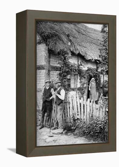 Two Men Chatting Outside a Cottage, Near Lucton, Herefordshire, C1922-AW Cutler-Framed Premier Image Canvas