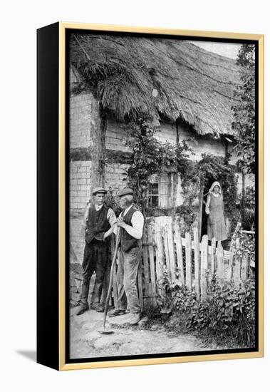 Two Men Chatting Outside a Cottage, Near Lucton, Herefordshire, C1922-AW Cutler-Framed Premier Image Canvas