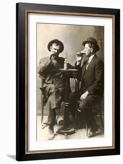 Two Men Drinking Beer-null-Framed Art Print